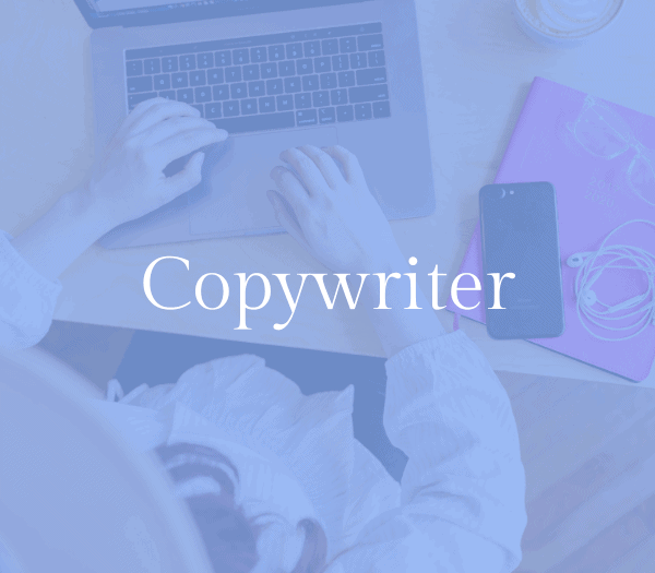 Copywriter sitting at a laptop and working