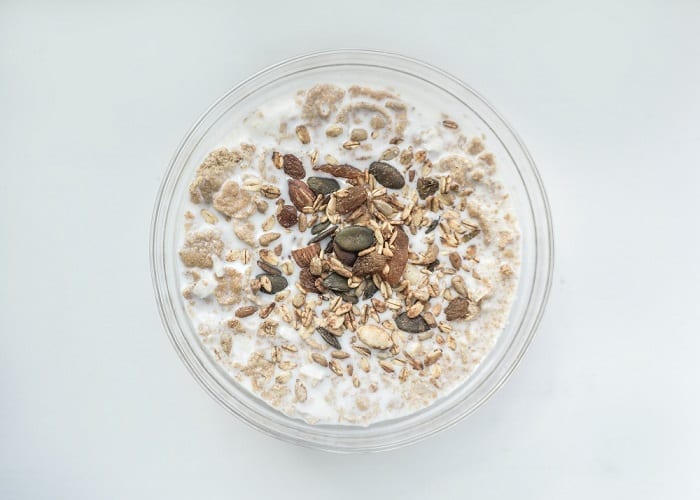 Bowl of muesli sitting on a table
